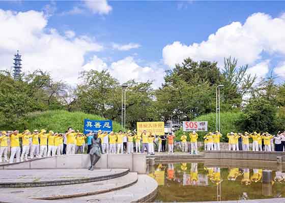 Image for article Nagoya, Giappone: Esercizi di gruppo e una parata espongono la persecuzione in Cina