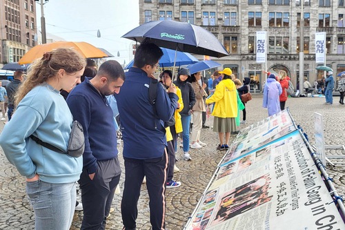 Image for article Paesi Bassi: Dignitari e persone di ogni estrazione condannano la persecuzione della Falun Dafa durante una manifestazione ad Amsterdam