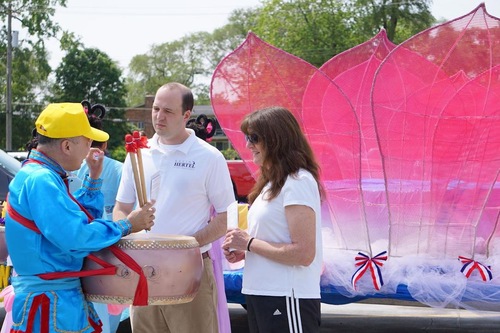 Image for article I Praticanti del Falun Gong partecipano alla giornata commemorativa del Michigan 