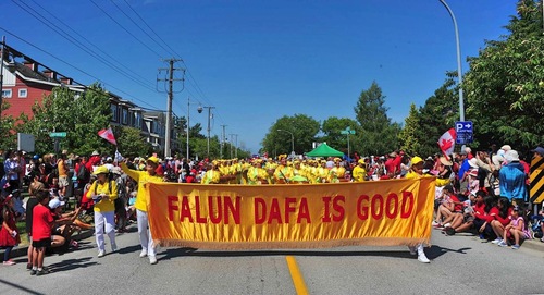 Image for article Canada Vancouver: I praticanti del Falun Gong si esibiscono durante le celebrazioni del Canada Day