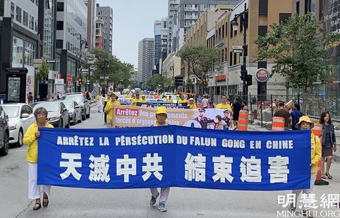 Image for article Montreal, Canada: Marcia per richiamare l'attenzione sui ventidue anni di persecuzione del regime comunista cinese