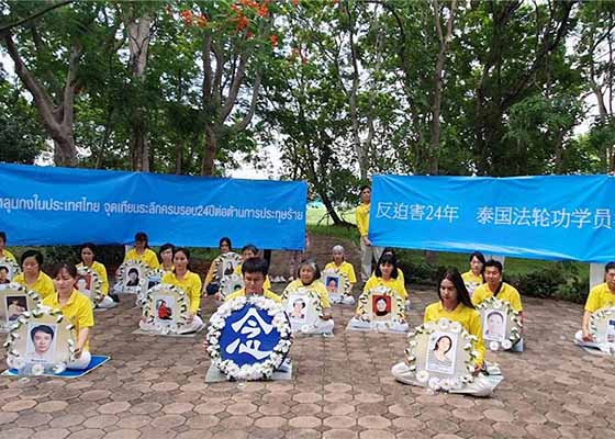 Image for article Thailandia: Veglia a lume di candela per commemorare le vittime della persecuzione del Falun Gong