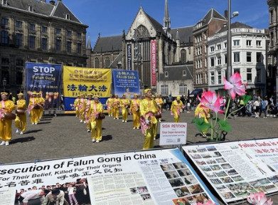 Image for article Paesi Bassi: Praticanti della Falun Dafa celebrano la Giornata Mondiale della Falun Dafa ad Amsterdam