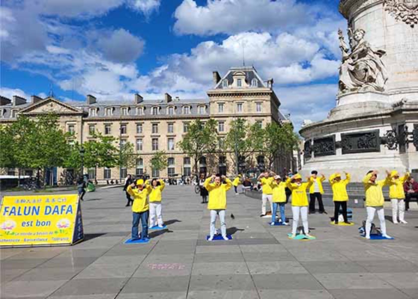 Image for article Parigi, Francia: Manifestazione in Piazza della Repubblica per porre fine alla persecuzione del regime comunista cinese