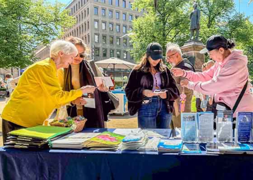 Image for article Finlandia: Presentazione della Falun Dafa al pubblico nella Giornata di Helsinki