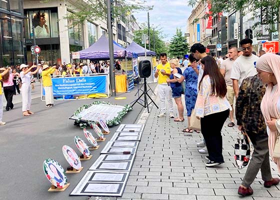 Image for article Germania: Un parlamentare mostra una lettera del PCC che diffama il Falun Gong durante un raduno per commemorare i 26 anni di persecuzione