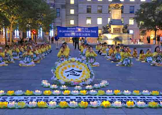 Image for article Montreal, Canada: Veglia a lume di candela in memoria dei praticanti del Falun Gong deceduti durante la persecuzione